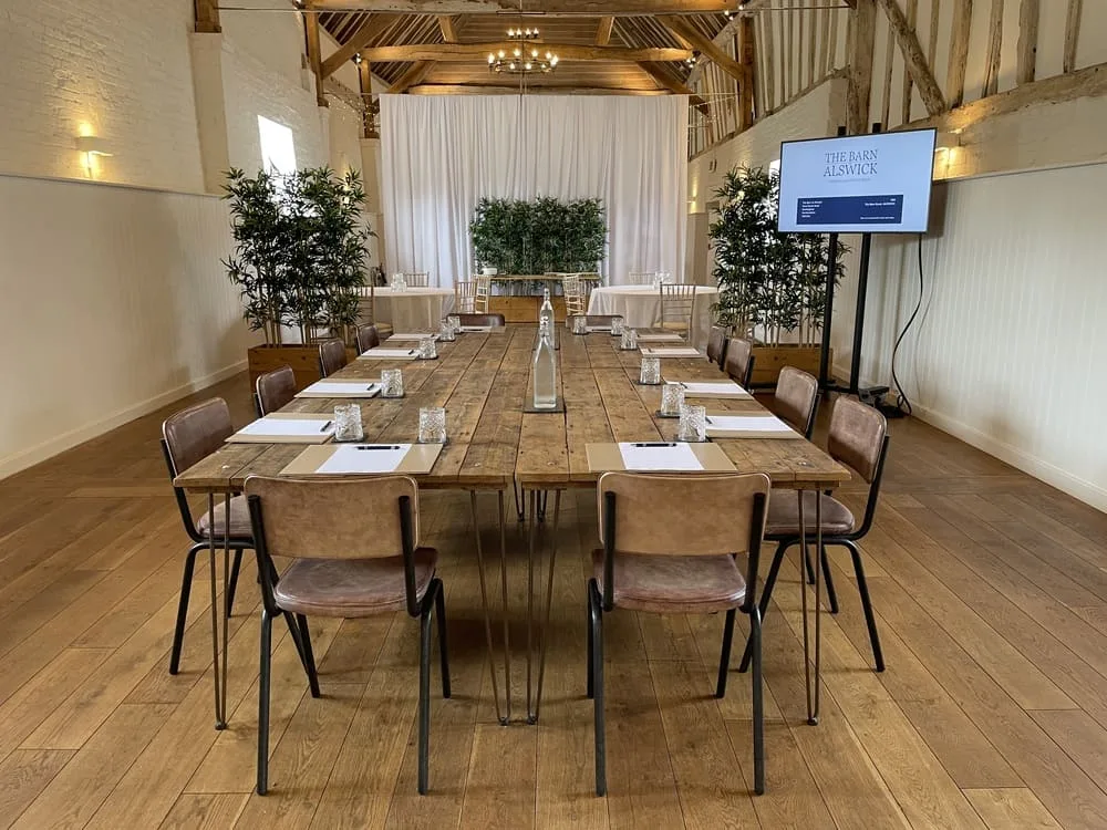Event tables inside the Barn at Alswick