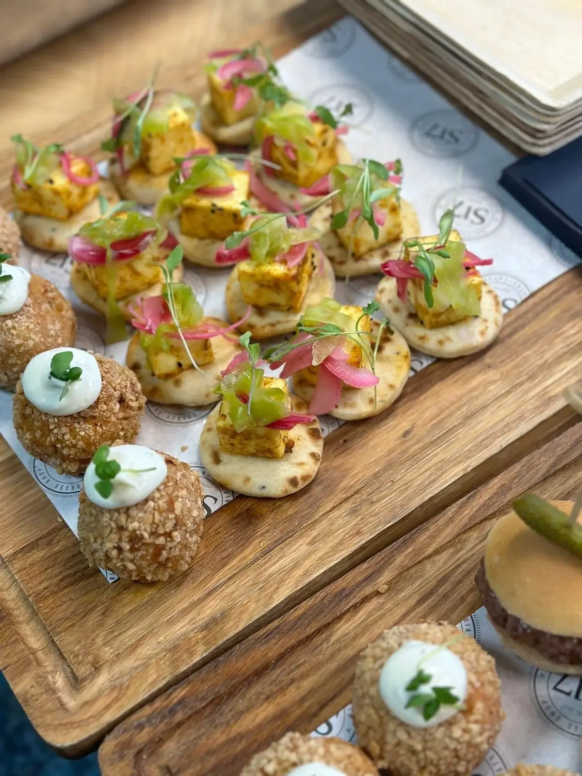 Canapés served on wooden boards at The Hide wedding and events venue, Sheffield