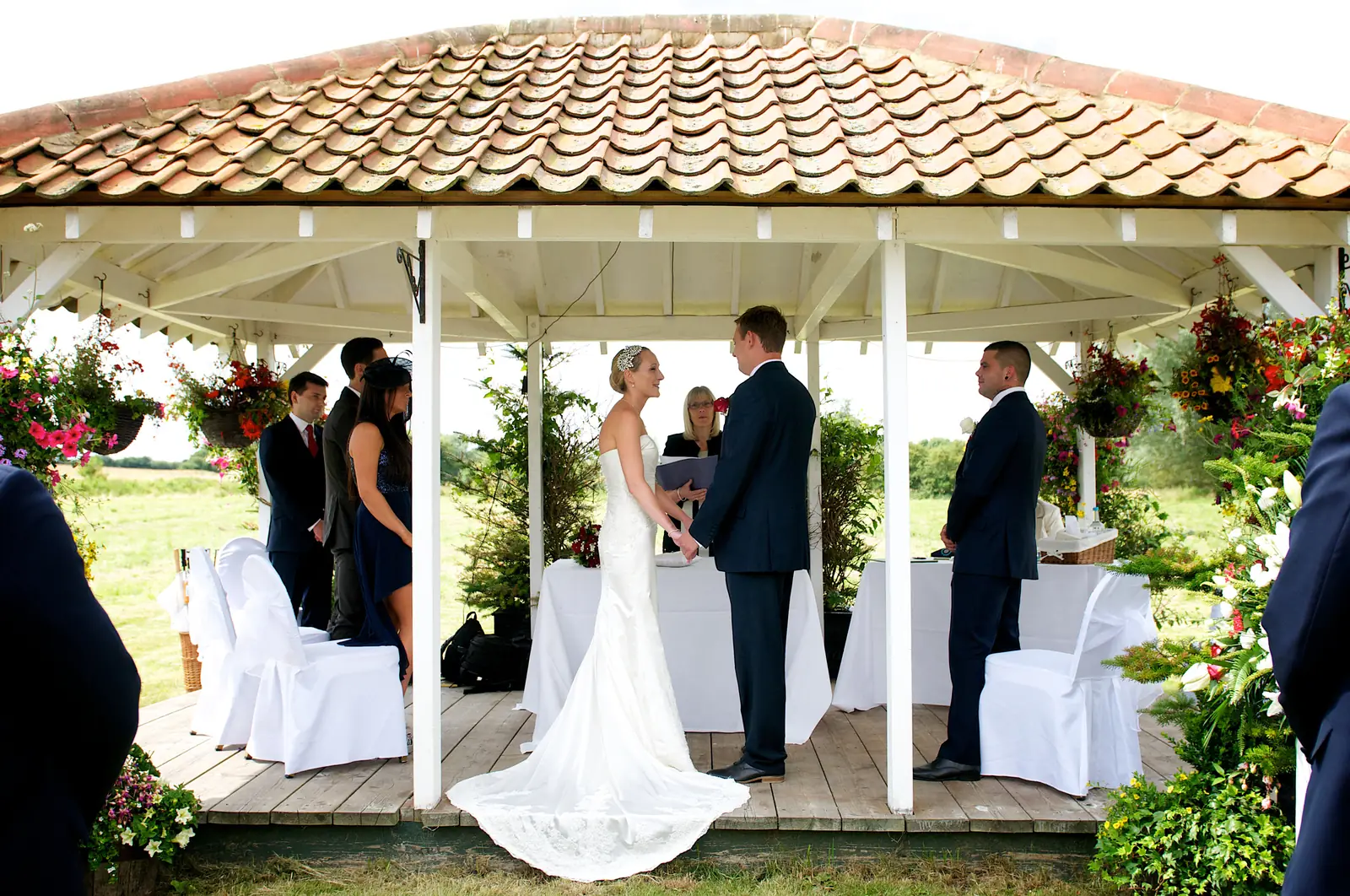 Couple standing in the rural wedding pavilion at The Reid Rooms. Link to venue hire only details
